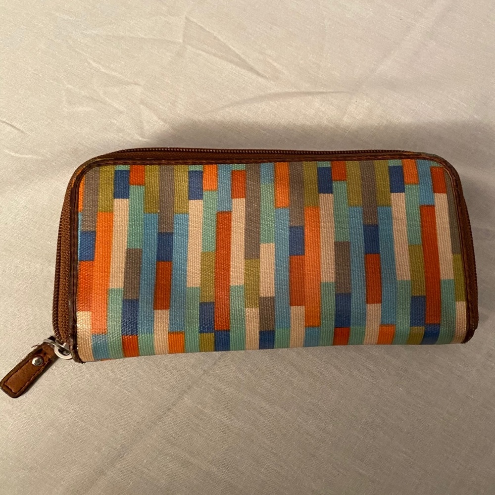 Used Fossil women yellow wallet